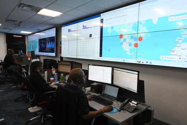 Staff members monitor operations in Delta Air Lines’ cargo control center on Thursday, May 28, 2026, in Atlanta. (Hyosub Shin/AJC)