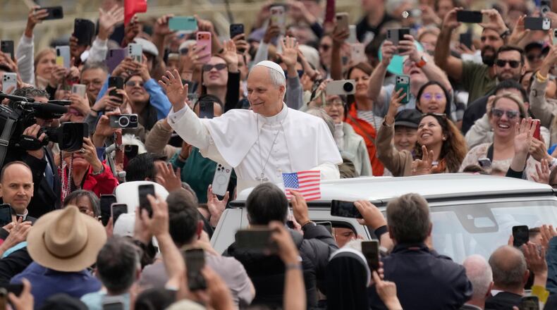 Pope Leo XIV arrives as he holds his weekly general audience in St. Peter's Square, at the Vatican, Wednesday, May 6, 2026. (AP Photo/Gregorio Borgia)