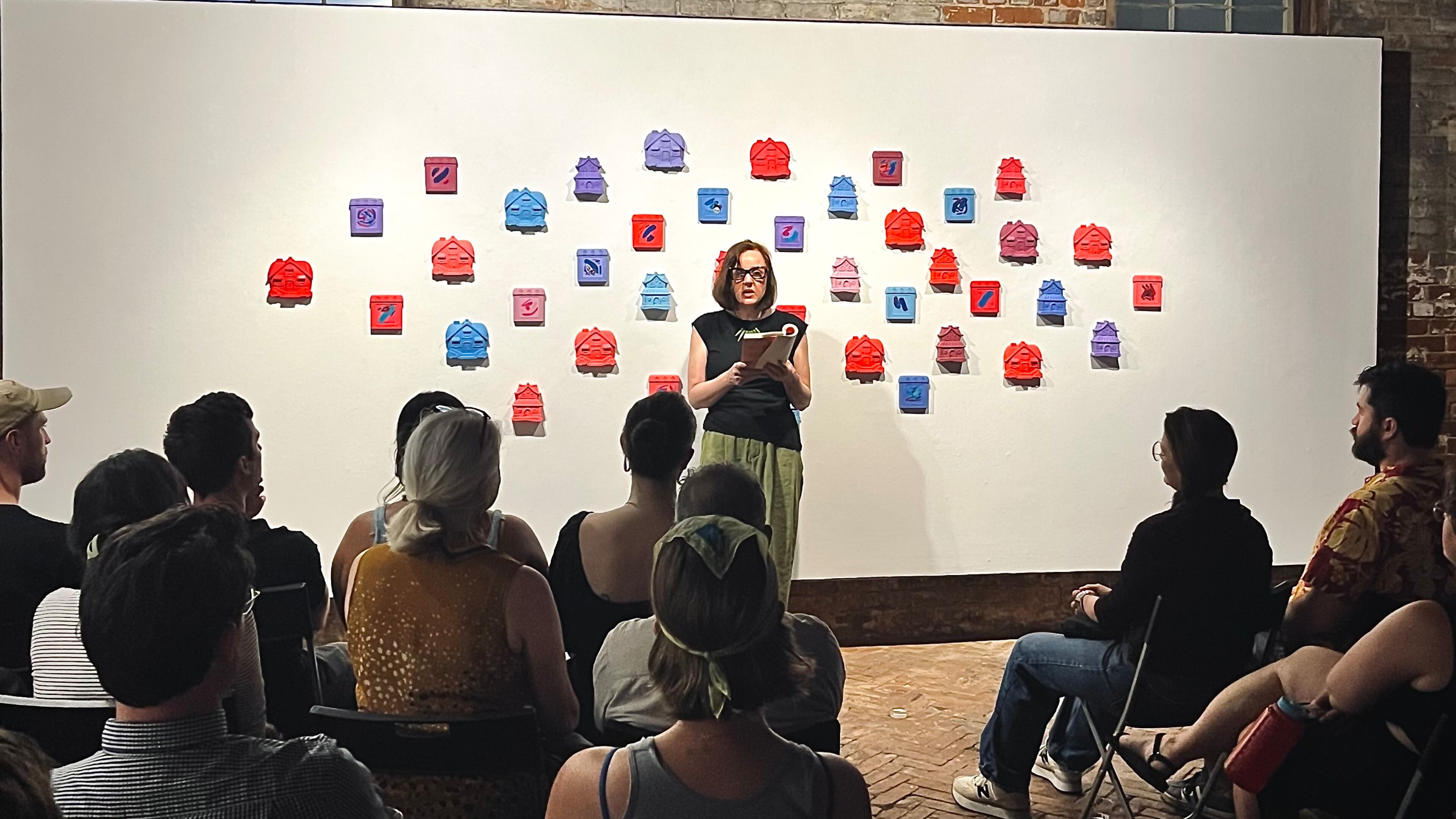 Author Julia Elliott reads from her new book "Hellions" during a Lost in the Letters event on Saturday, June 14, 2025, at Whitespace Gallery in Atlanta. (Courtesy of Lost in the Letters)