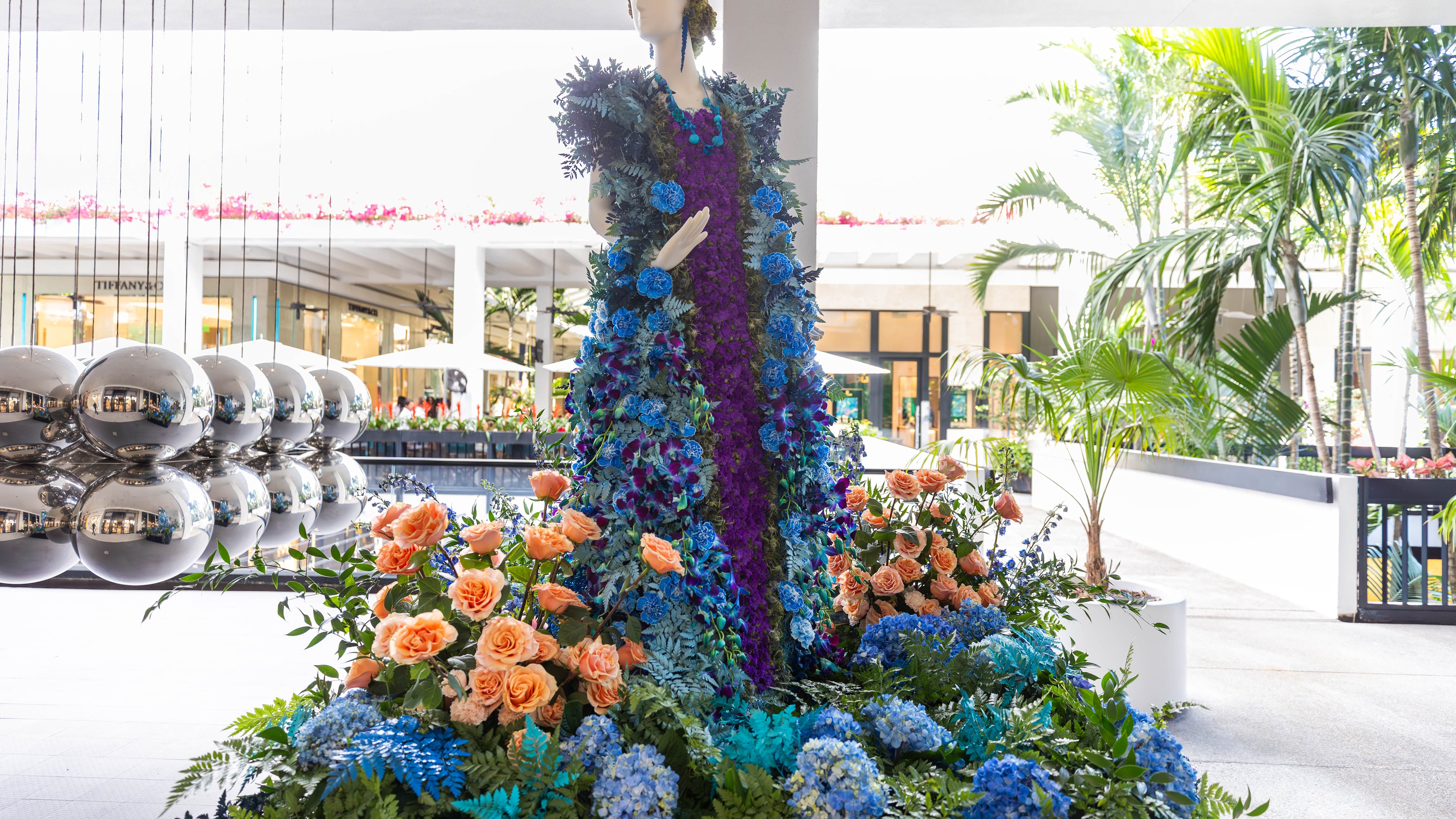 The fashion of Lady Rosamond Painswick is depicted in flowers in Fleurs de Villes’ “Downton Abbey” floral installation during a Florida tour stop earlier this year. A similar one will be presented in Atlanta at Phipps Plaza and other locations starting Wednesday, April 2. (Courtesy)