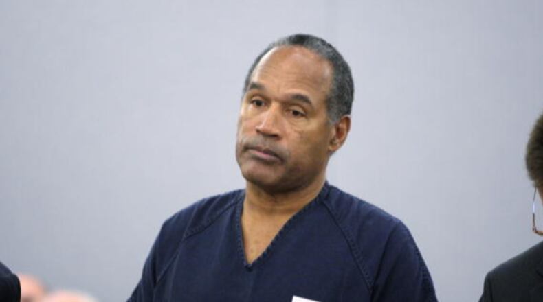OJ Simpson is pictured here during his sentencing at the Clark County Regional Justice Center in December of 2008 in Las Vegas, Nevada, on 12 charges, including felony kidnapping, armed robbery and conspiracy.