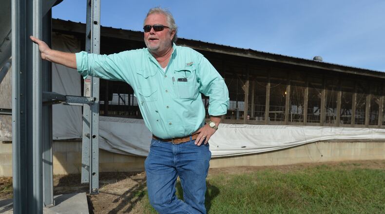 Terry Danforth raises as many as 7,500 hogs on his farm near Nashville, Ga., about 200 miles south of Atlanta. He would like to expand if the state eases its pollution rules. BRANT SANDERLIN /BSANDERLIN@AJC.COM