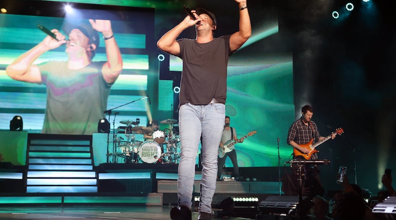 Leesburg native Luke Bryan brought his Raised Right Tour to a packed Cellairis Amphitheatre at Lakewood on Saturday, July 9, 2022, in Atlanta with Riley Green and Mitchell Tenpenny opening the show. (Photo: Robb Cohen for The Atlanta Journal-Constitution)