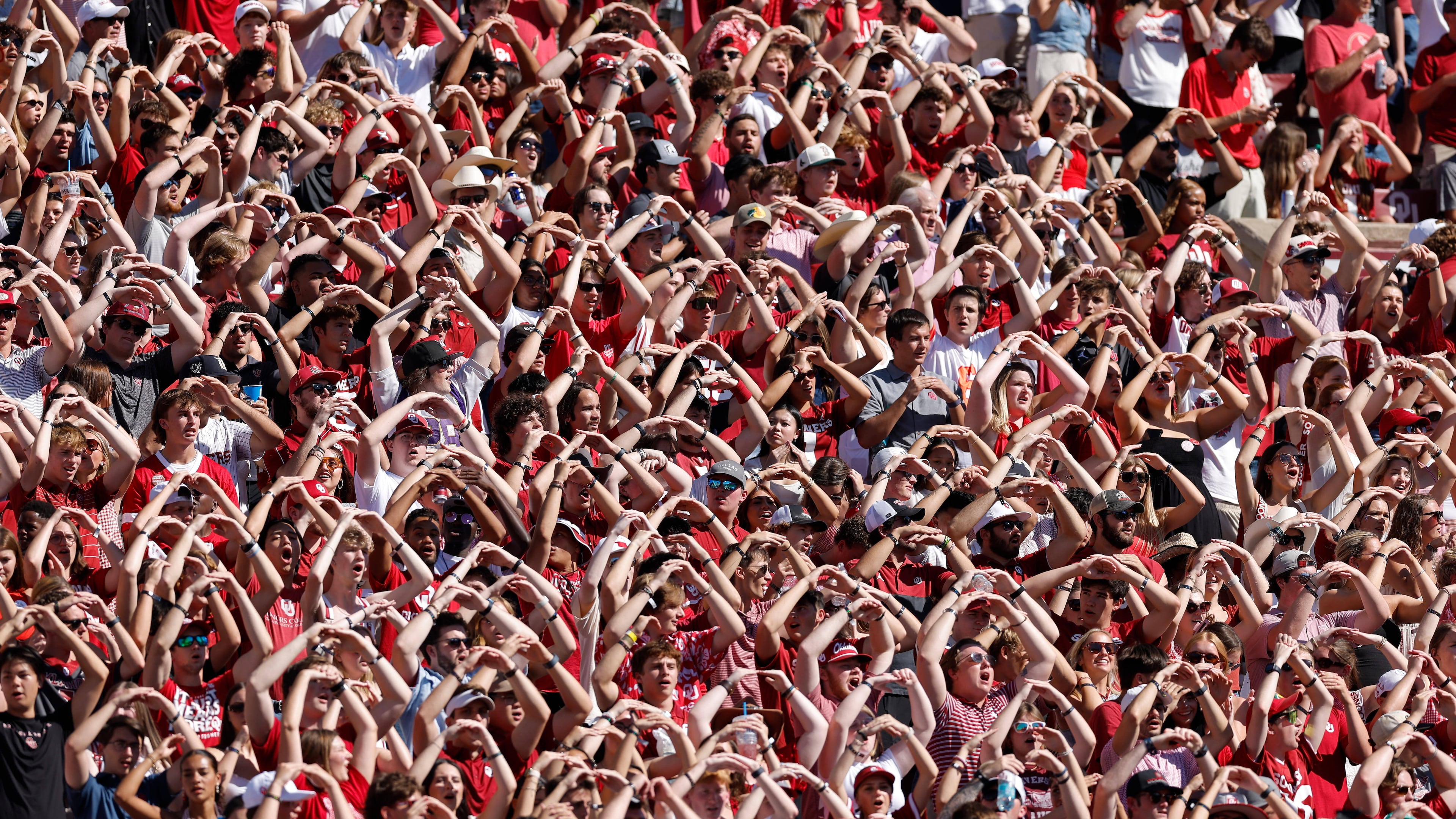 Oklahoma fans cheer for their team during the first half of an NCAA college football game against Kent State, Saturday, Oct. 4, 2025, in Norman, Okla. (AP Photo/Alonzo Adams)