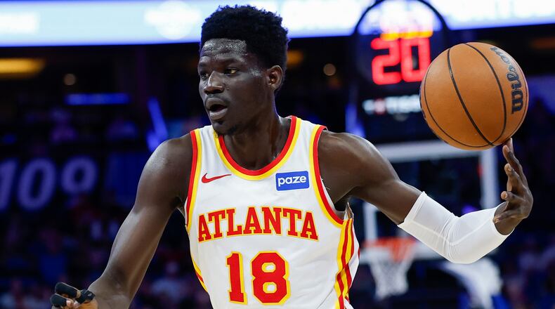 FILE - Atlanta Hawks forward Mouhamed Gueye (18) drives against the Orlando Magic during the first half of an NBA basketball game Wednesday, April 1, 2026, in Orlando, Fla. (AP Photo/Kevin Kolczynski, File)