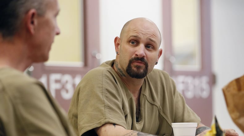 November 20, 2019 - Lawrenceville - Jack Cleveland sits in the day room during free time with other inmates. The Gwinnett County jail has designated a new housing unit just for inmates who are military veterans. “The Barracks” is intended to be a therapeutic, 70-bed unit focused on providing the type of support crucial to helping incarcerated veterans make a successful transition back into the community. Bob Andres / robert.andres@ajc.com