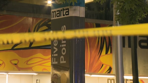 Crime scene tape is strung up at the Five Points MARTA station after police say a man shot two officers during a confrontation late Thursday, Aug. 7, 2025. (Channel 2 Action News)