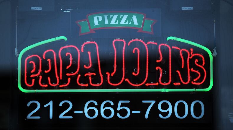 A 28-year-old Papa John’s pizza delivery man was shot and killed Tuesday night while making a delivery to an apartment complex in Lawrenceville, Gwinnett County police said Wednesday.