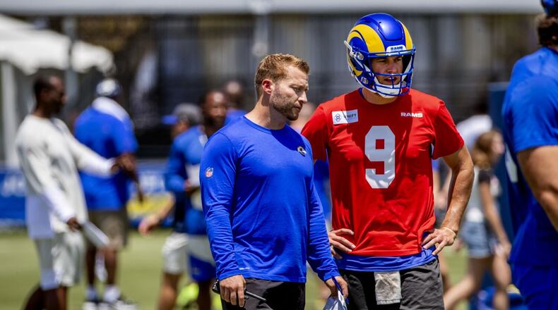 Rams coach Sean McVay confers with quarterback Matthew Stafford during training camp. The Falcons will face the disgruntled-and-rested Rams at 4:05 p.m. Sunday at SoFi Stadium. (Gina Ferazzi/Los Angeles Times/TNS)