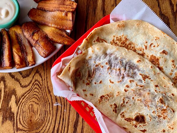 With two locations in the Atlanta suburbs, Brisas de Tela prominently features baleadas on its menu. (Christopher Hassiotis for the AJC)
