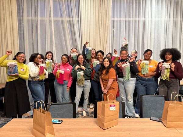 Lexi Bynum of Atlanta Craft Club hosts events around town. Here, she collaborated with the Woven Co. to make fluffy cloud tapestry at the Hyatt Centric Midtown. (Courtesy of Atlanta Craft Club)