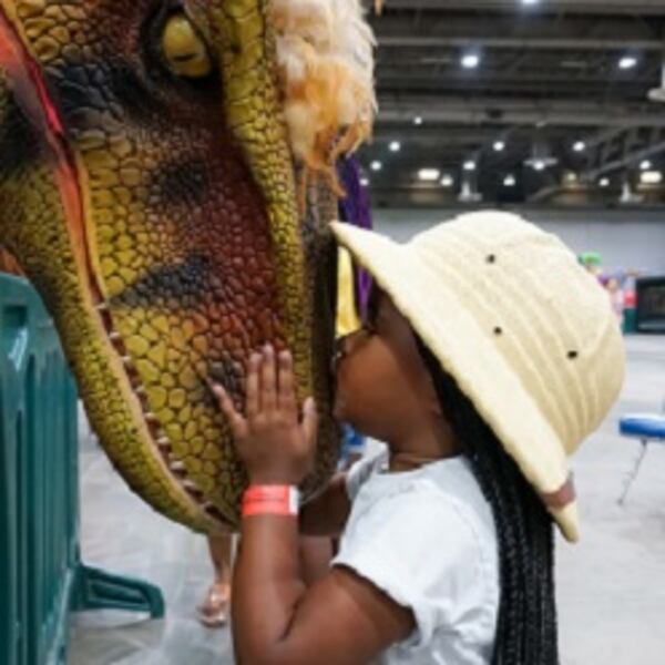 See life-size animatronic dinosaurs including the 50-foot long megalodon at the Georgia World Congress Center.