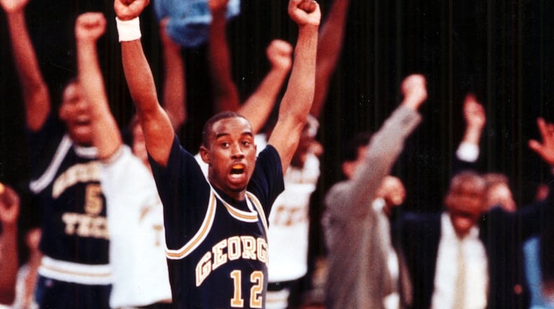 Georgia Tech guard Kenny Anderson (12) celebrates the shot that sent the game into overtime. (AJC file photo by Michael A. Schwarz)
