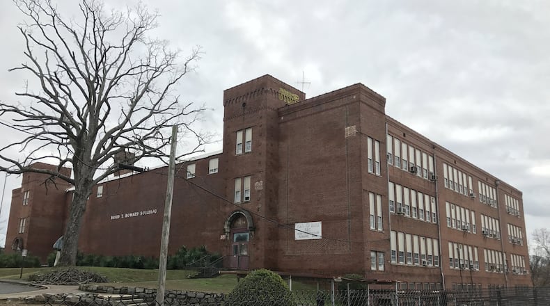 The David T. Howard School building, named after the former slave and businessman who donated the land, is shown in these photographs taken on Jan. 10, 2018. Vanessa McCray/AJC