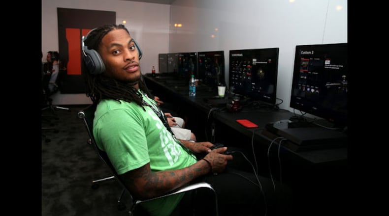 <p>Rapper Waka Flocka Flame visits Activision's Call of Duty: Black Ops 3 booth during E3 2015 at Los Angeles Convention Center on June 18, 2015 in Los Angeles, California. (Photo by Imeh Akpanudosen/Getty Images for Activision)</p>