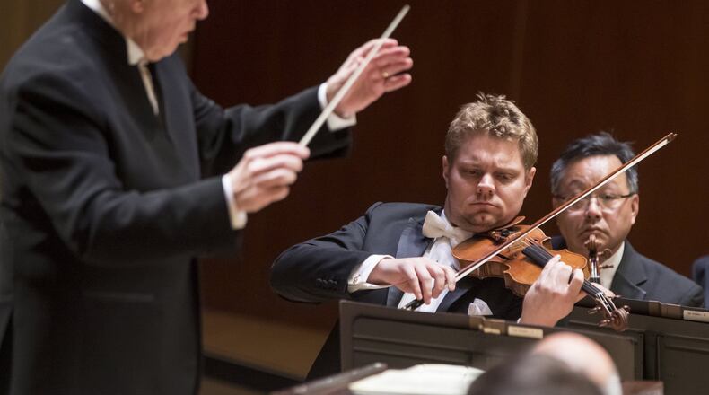 Conductor Edo de Waart conducts concertmaster David Coucheron and the ASO in “Ein Heldenleben.”