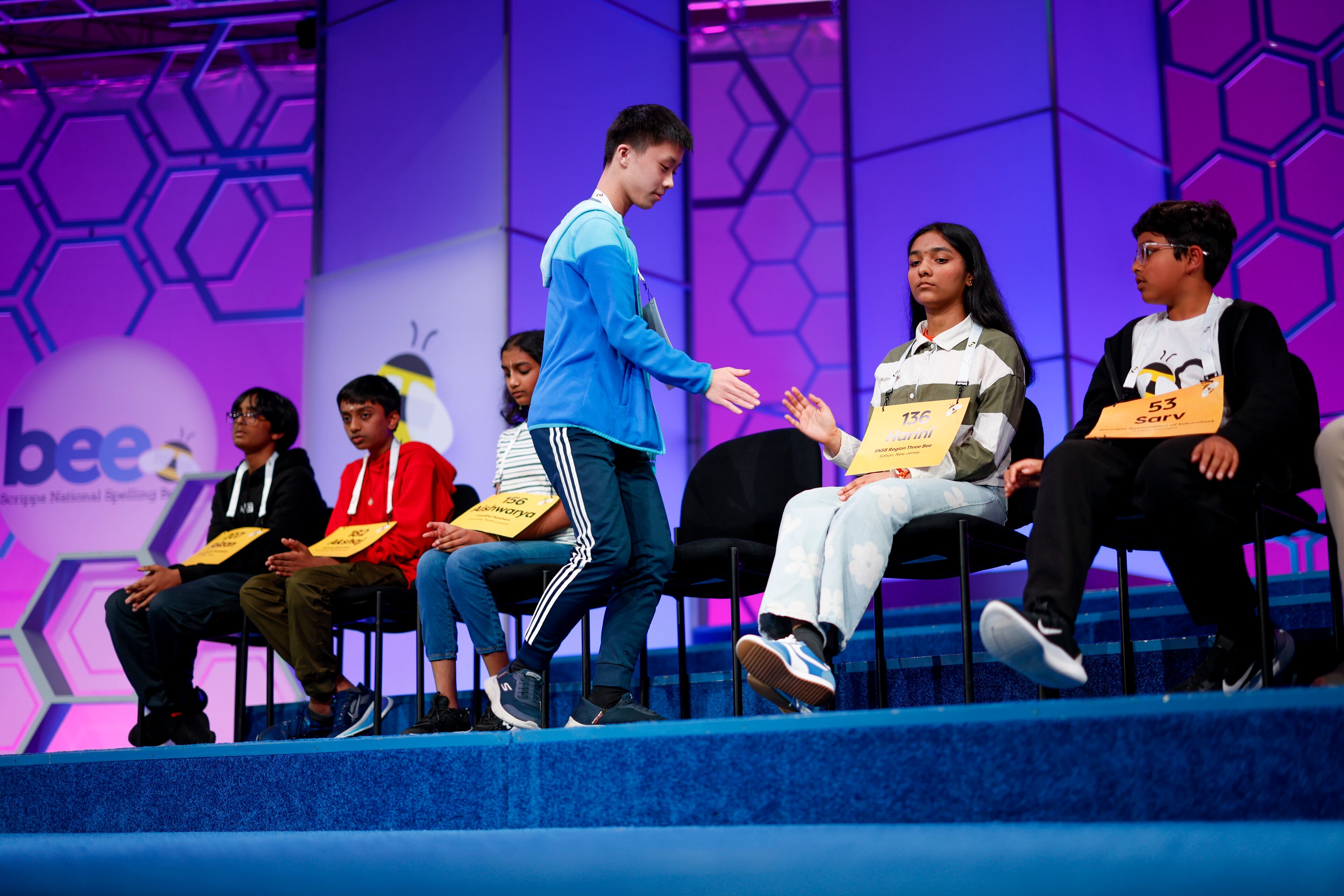 Brian Liu, 13, of Great Neck, N.Y., and Harini Murali, 13, of Edison, N.J., during the finals of the Scripps National Spelling Bee in National Harbor, Md., on Thursday, May 29, 2025. (Ting Shen/The New York Times)