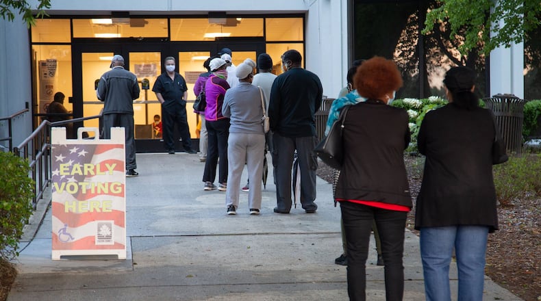 People stand in line to vote at the South Fulton Service Center early on Friday morning, May 22, 2020. STEVE SCHAEFER FOR THE ATLANTA JOURNAL-CONSTITUTION