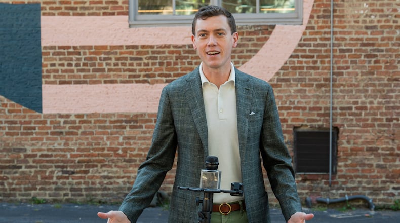 Garrett Langley, founder and CEO of Flock Safety, speaks during a press event in South Downtown, Atlanta, on Friday, Sept. 20, 2024. Langley discussed the implementation of AI-powered security cameras to address safety concerns in the neighborhood. (Olivia Bowdoin for the AJC).