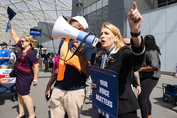 Sara Nelson, president of the Association of Flight Attendants, chants during a Delta Air Lines pro-union flight attendants rally on Thursday, March 25, 2023, at Hartsfield-Jackson Atlanta International Airport. Delta employees including flight attendants and pilots as well as other pro-union organizers rallied outside of the airport's south terminal. (Christina Matacotta for the AJC)