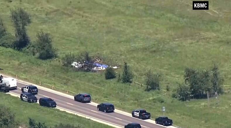 This video frame grab provided by KMBC-TV shows an aerial view of the crash scene near the Butler Memorial Airport in Butler, Mo., Sunday, June 14, 2026. (KMBC-TV via AP)