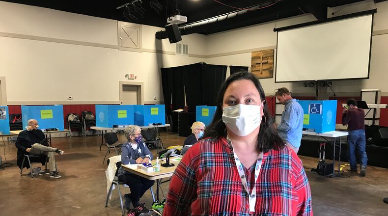 Morgan County Elections Director Jennifer Doran inside a polling at Centennial Baptist church on Jan. 5, 2021. It's been a challenging couple months for her and other local election officials across Georgia. Some poll workers have been out sick with Covid-19, while voters have become more suspicious of the election system in the wake of unfounded claims of election fraud in the state.