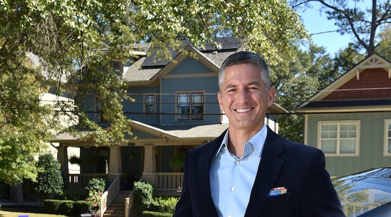 Steven Prediletto bought an electric car and then decided to add solar panels to his Brookhaven home. He financed $30,000 worth of solar panels through a third-party leasing firm in California. BRANT SANDERLIN/BSANDERLIN@AJC.COM