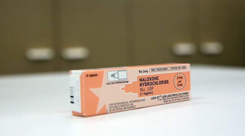 A box of the overdose antidote Naloxone Hydrochloride sits on a counter at a Walgreens store on February 2, 2016 in New York City. Hundreds of Duane Reade and Walgreen Co. pharmacies will begin giving out the heroin antidote without a prescription across New York state as the heroin epidemic continues to spread. Naloxone, more commonly known by the brand name Narcan, can temporarily block the effects of heroin, OxyContin and other painkillers. It is estimated that one person dies every day in New York from a drug overdose. (Photo by Spencer Platt/Getty Images)