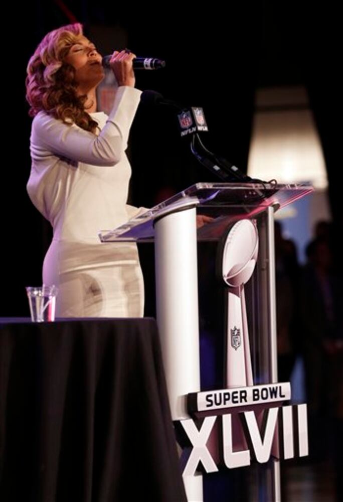 Beyonce at pre-Super Bowl news conference