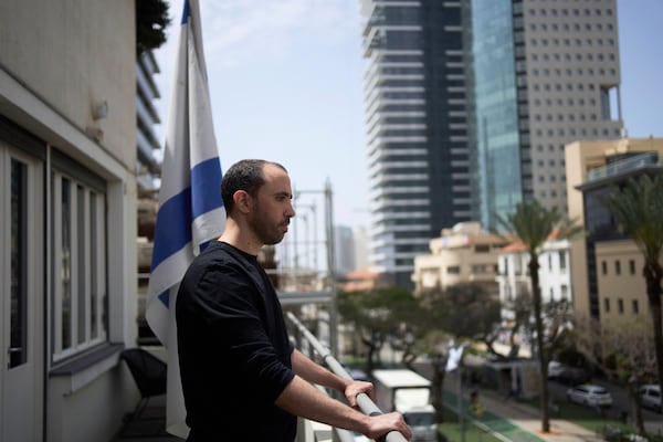 Freed Israeli hostage Tal Shoham, who was held by Hamas militants in the Gaza Strip, poses for a portrait in Tel Aviv, Israel, Tuesday, April 22, 2025. (AP Photo/Maya Alleruzzo)