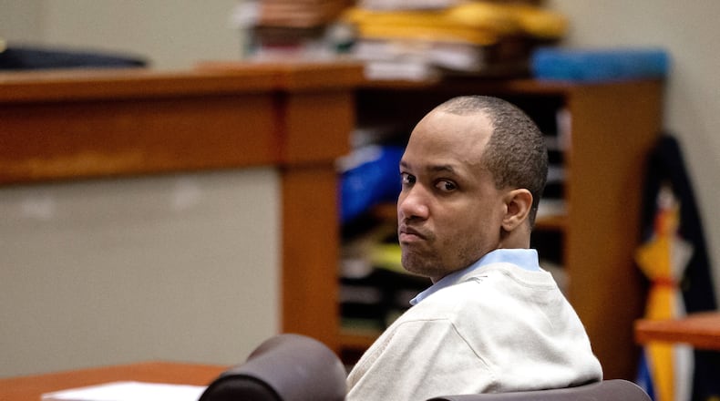 Gregory Williams looks back at the potential jurors in the DeKalb County courtroom during the jury selection portion of his trial Monday, January 13, 2020.   STEVE SCHAEFER / SPECIAL TO THE AJC
