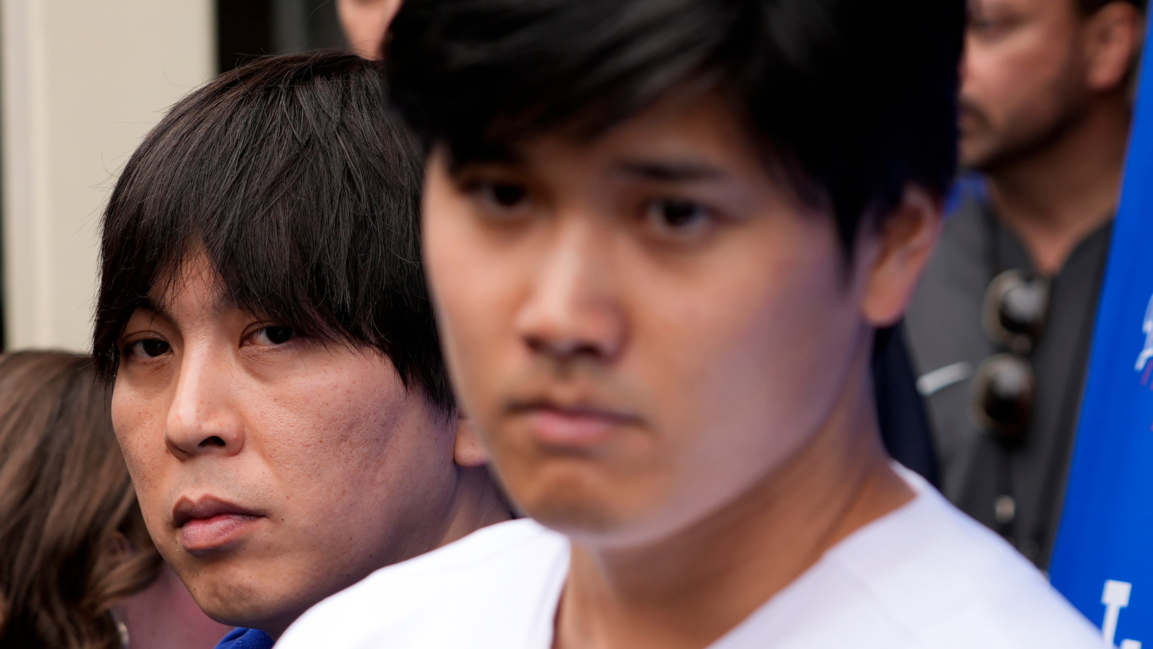 FILE - Ippei Mizuhara, left, stands next to Los Angeles Dodgers player Shohei Ohtani, right, during an interview at Dodger Stadium, Feb. 3, 2024. (AP Photo/Richard Vogel, File)