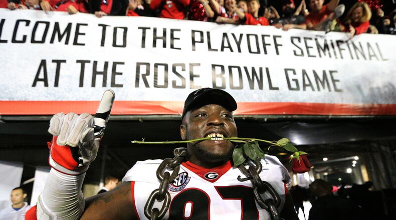 January 1, 2018 Pasadena: Georgia defender John Atkins celebrates beating Oklahoma 54-48 during double over time in the College Football Playoff Semifinal at the Rose Bowl Game on Monday, January 1, 2018, in Pasadena.    Curtis Compton/ccompton@ajc.com
