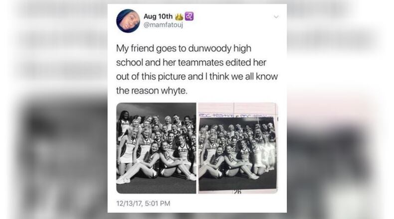 The tweet, since deleted, shows two versions of the same photo of Dunwoody High School cheerleaders. In one, a black cheerleader is missing.