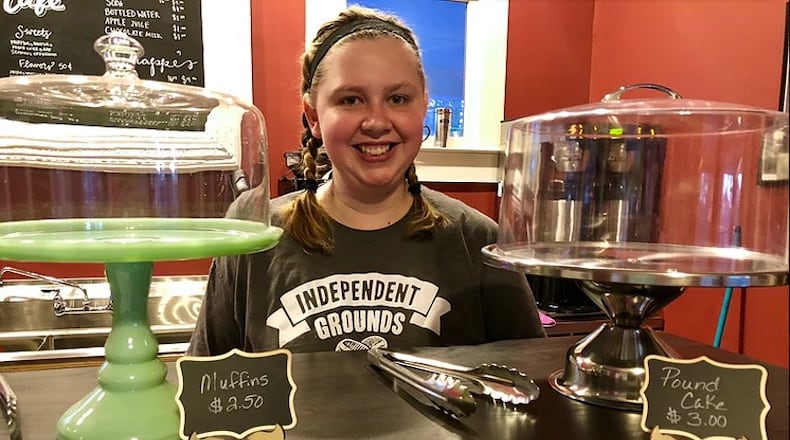 Emma Heid works at the Independent Grounds Coffee shop in Kennesaw, Ga.