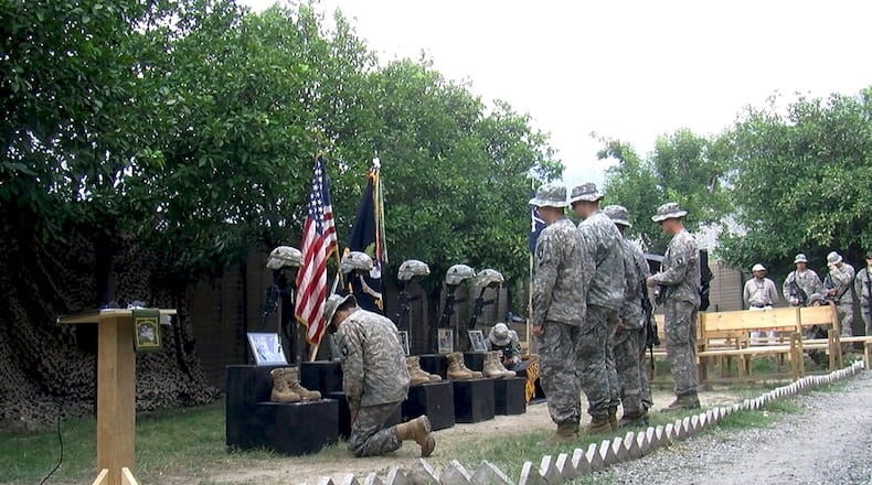 "No Greater Love," a documentary produced by former Army Chaplain Justin David Roberts depicts the combat deployment of the 101st Airborne Division's "No Slack" Battalion. They didn't all come home. Photos: Atlas Distribution Company