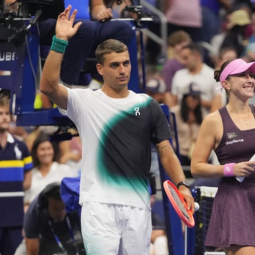 Belinda Bencic, of Switzerland, and Flavio Cobolli, of Italy, left, celebrate after defeating Elina Svitolina, of Ukraine, and Gael Monfils, of France, in a mixed doubles semifinal match at the U.S. Open tennis championships Wednesday, Aug. 26, 2026, in New York. (AP Photo/Frank Franklin II)