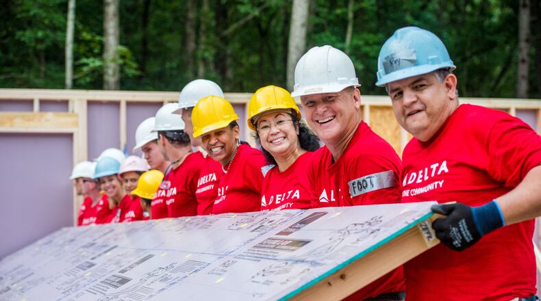 Delta Air Lines employees volunteer with Habitat for Humanity to build homes in Atlanta on Thursday, Sept. 6, 2018.