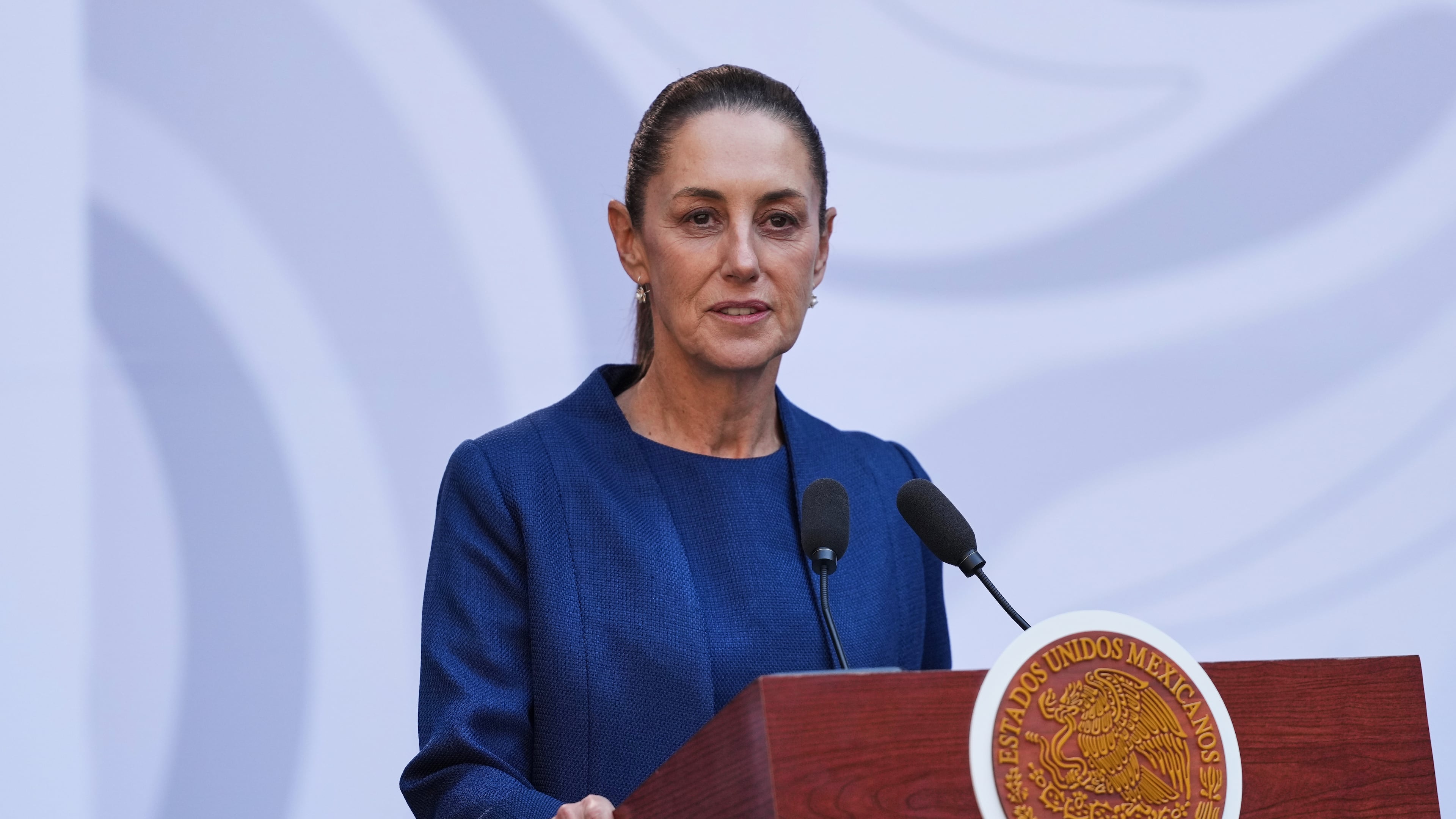 Mexican President Claudia Sheinbaum present a new security strategy against violence for Michoacan state, at the National Palace, in Mexico City, Sunday, Nov. 9, 2025. (AP Photo/Claudia Rosel)