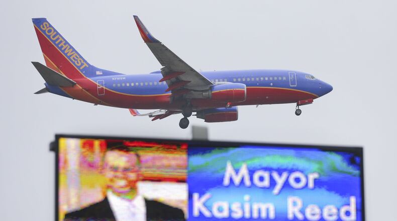 A billboard of Atlanta Mayor Kasim Reed welcomes people to the city. JOHN SPINK / JSPINK@AJC.COM AJC File Photo