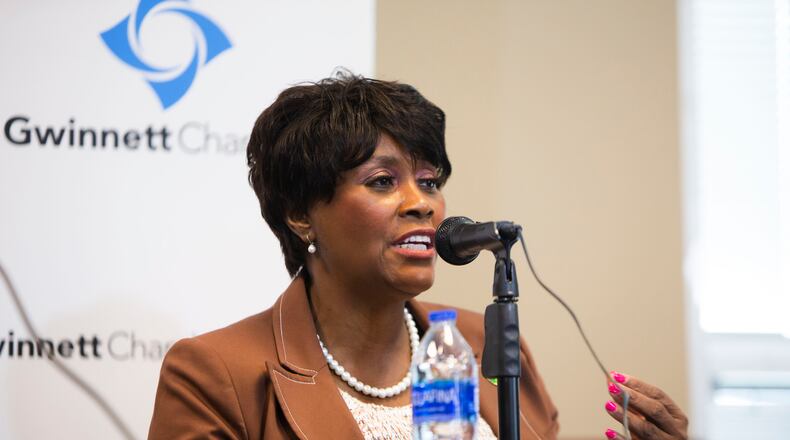 Marlene Fosque, district four candidate for Gwinnett County Commission, speaks during the Gwinnett Chamber of Commerce forum for county commission candidates on Thursday, October 6, 2022, at the Richard L. Tucker building in Duluth, Georgia. Nicholas Masino, president & chief executive officer at the Gwinnett Chamber of Commerce, hosted the event in anticipation of the upcoming county commission election. CHRISTINA MATACOTTA FOR THE ATLANTA JOURNAL-CONSTITUTION.