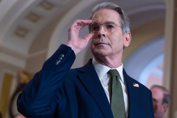 Treasury Secretary Scott Bessent talks to reporters about his lunch meeting with Republican senators and the schedule for getting the Republican megabill to President Donald Trump's desk by July 4, at the Capitol in Washington, Tuesday, June 24, 2025. (AP Photo/J. Scott Applewhite)