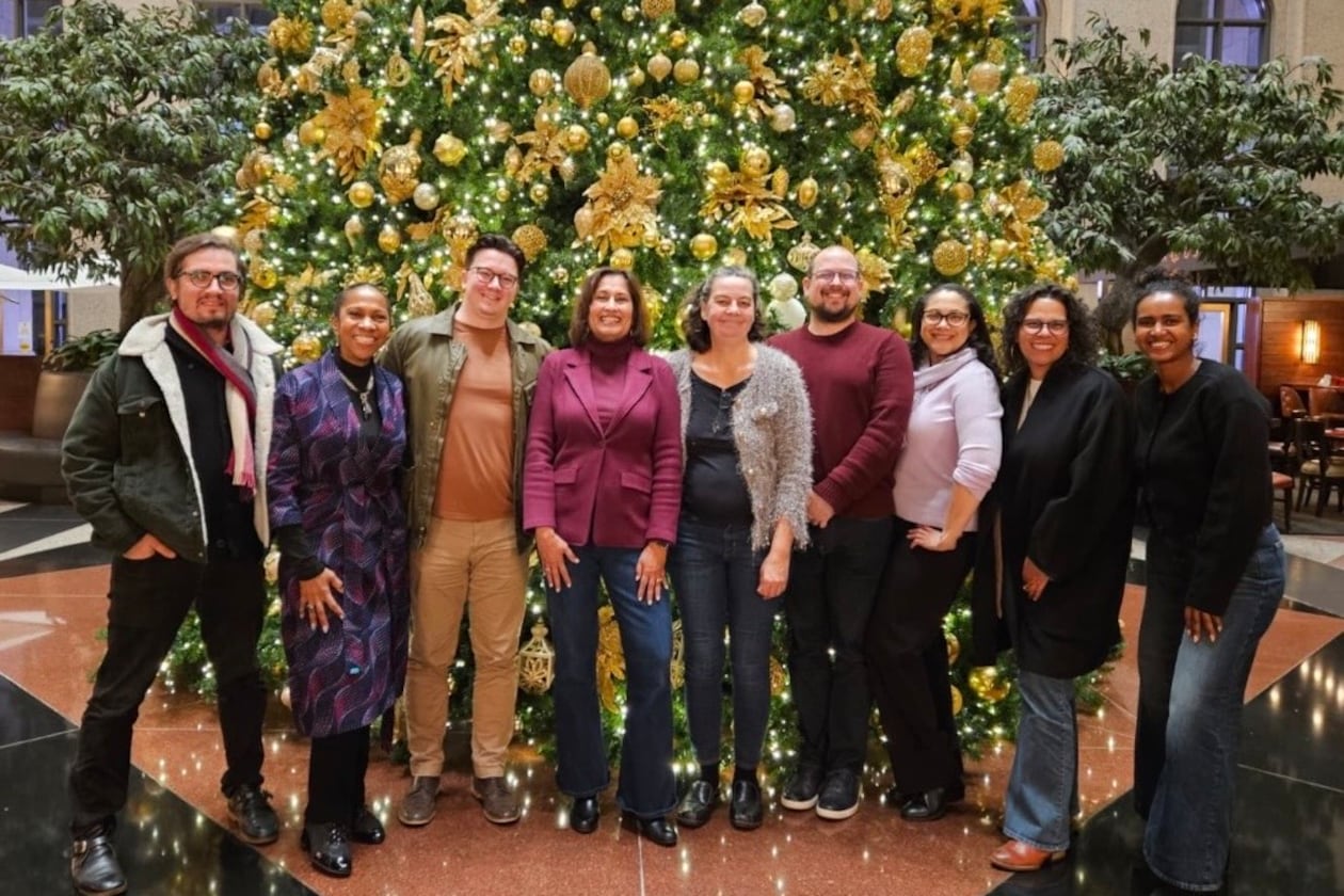 The staff of Atlanta Civic Circle gathers at its annual Christmas dinner in 2025. (Courtesy of Saba Long)