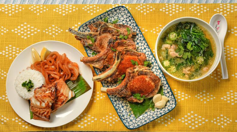 Filipino dishes made in metro Atlanta include (from left) Bistek na Isda (sauteed cod with onions), Fried Adobo Pork Chops and Suam Na Mais (a Filipino corn soup). These dishes come from Mike Pimentel, founder of Filipino pop-up Adobo ATL. Styling by Mike Pimentel / Chris Hunt for The Atlanta Journal-Constitution