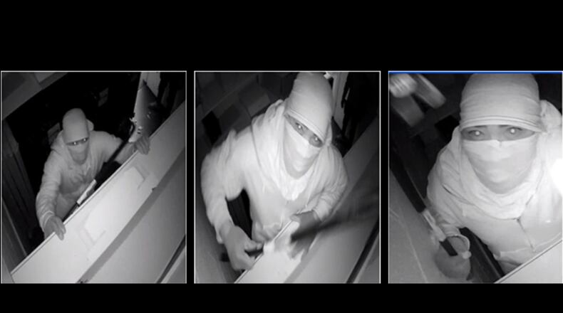 Gwinnett County police believe two suspects, including one pictured above, have burglarized AT&T stores in Stone Mountain and six other jurisdictions.