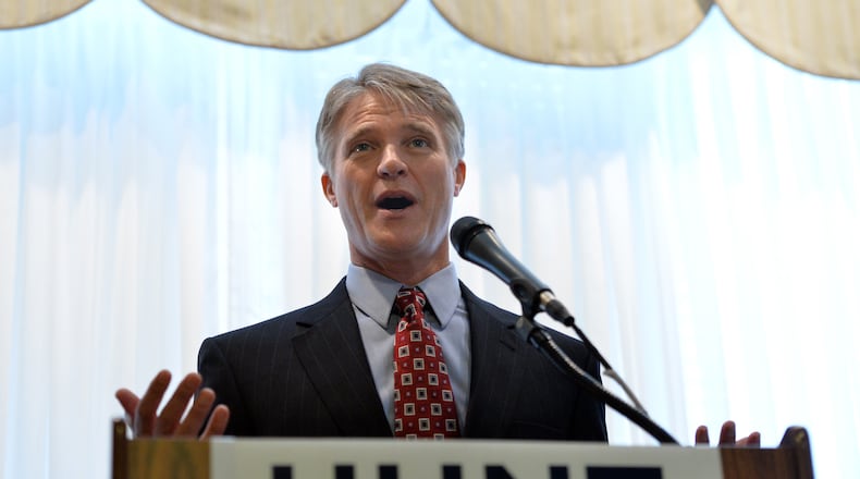 October 3, 2014 Smyrna - Andrew Hunts peaks during a press conference with David Pennington and Andrew Hunt regarding endorsement at Smyrna Community Center on Friday, October 3, 2014. Libertarian governor candidate Andrew Hunt receives the endorsement of former Dalton Mayor David Pennington, who received tea party support while challenging incumbent Gov. Nathan Deal. HYOSUB SHIN / HSHIN@AJC.COM Libertarian candidate for governor Andrew Hunt. Hyosub Shin, hshin@ajc.com