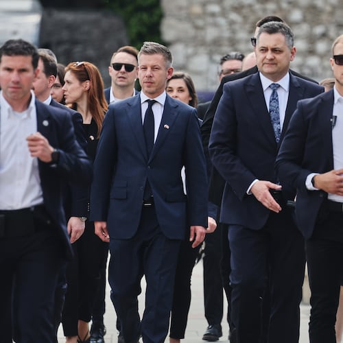 Hungarian Prime Minister Peter Magyar, center, arrives at the Wawel Cathedral during his visit in Krakow, Poland Tuesday, May 19, 2026. (AP Photo/Beata Zawrzel)