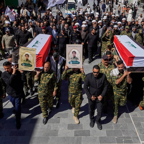 FILE - Members of the Popular Mobilization Forces attend a funeral for colleagues who were killed in a U.S. airstrike in Anbar, in Najaf, Iraq, Wednesday, April 1, 2026. (AP Photo/Anmar Khalil, File)