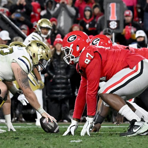 Georgia and Georgia Tech played a classic game last season at Sanford Stadium, going to eight overtimes. (Hyosub Shin/AJC)