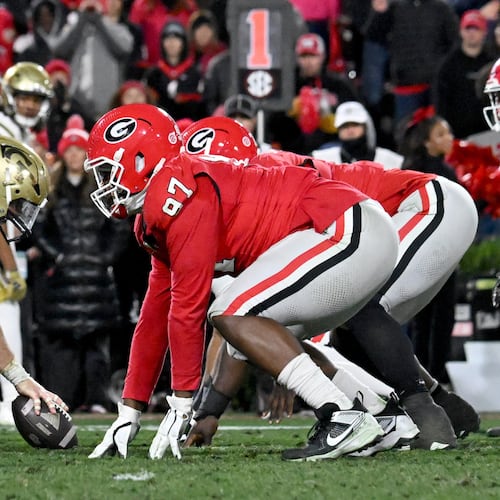 Georgia and Georgia Tech played a classic game last season at Sanford Stadium, going to eight overtimes. (Hyosub Shin/AJC)